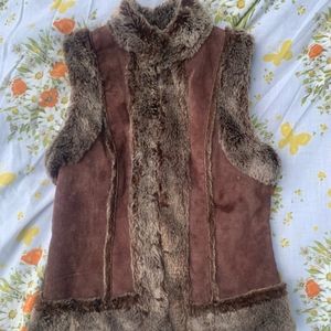 Live a Little leather and faux fur vest.